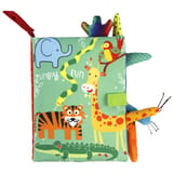 Primer plano del libro de tela verde con elefante, jirafa, tigre y cocodrilo, y cintas y mordedores de colores en los bordes