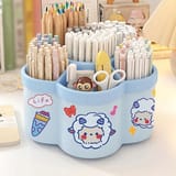 Organizador color celeste con divisiones para lápices y tijeras con diseño de ovejita.