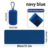 Estuche azul marino acotado en alto y ancho, toalla doblada y toalla azul extendida con sus medidas.